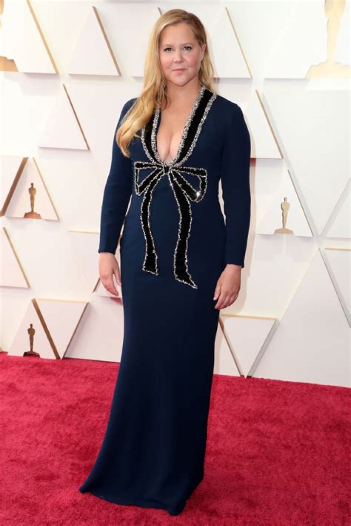 Amy Schumer Accidentally Flashes Bare Nipple in Epic Wardrobe Malfunction Photo