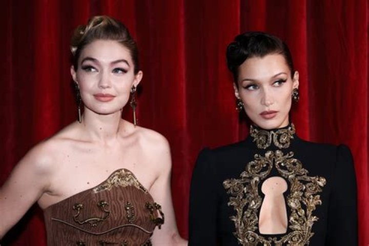 Gigi and Bella Hadid Are Unrecognizable With Bleached Eyebrows While Walking in Versace’s Milan Show