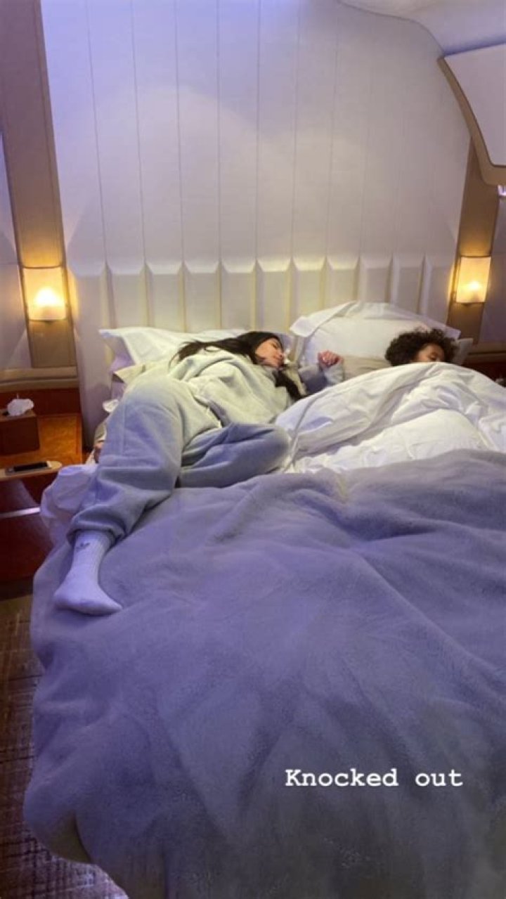 Kim Kardashian Snuggles Up With Saint West on a Private Plane: ‘Knocked Out’