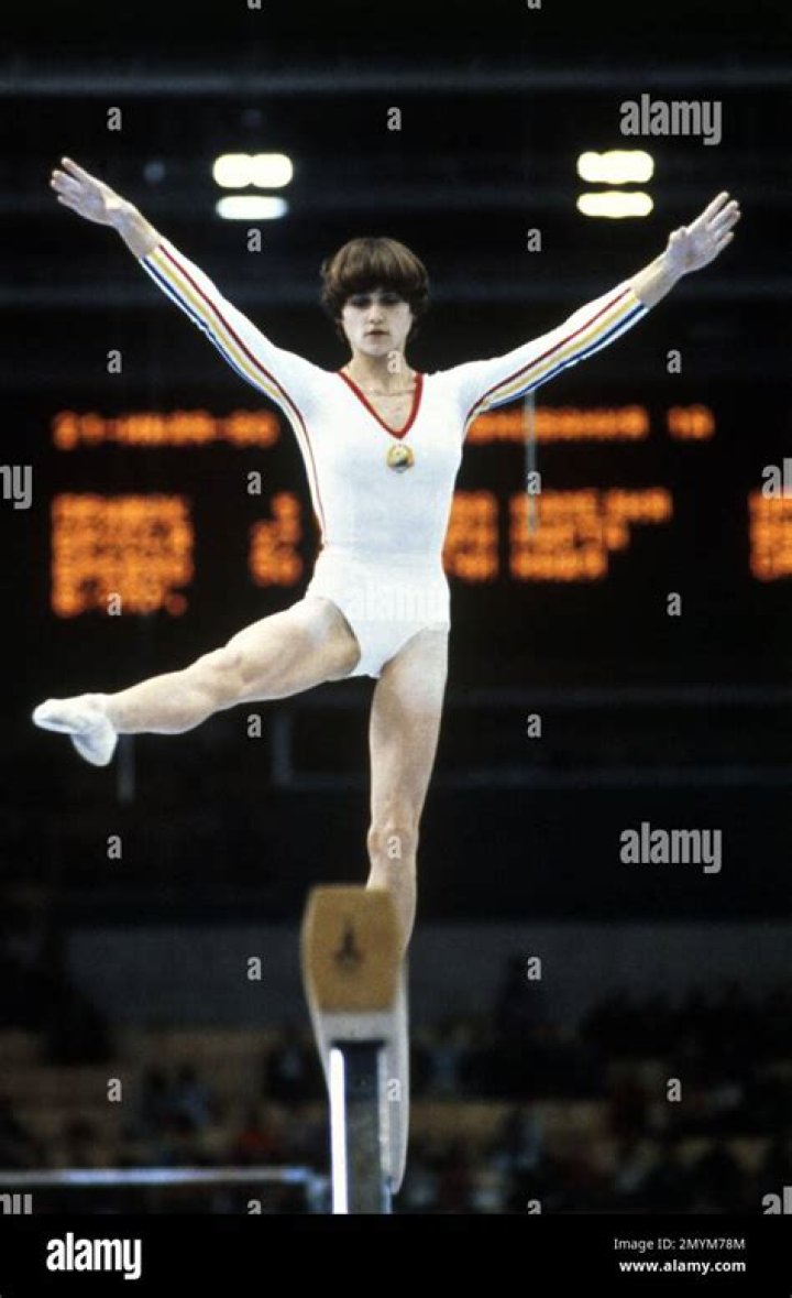 Nadia Comaneci (Gymnast) - Age, Birthday, Bio, Facts, Family, Net Worth, Height & More